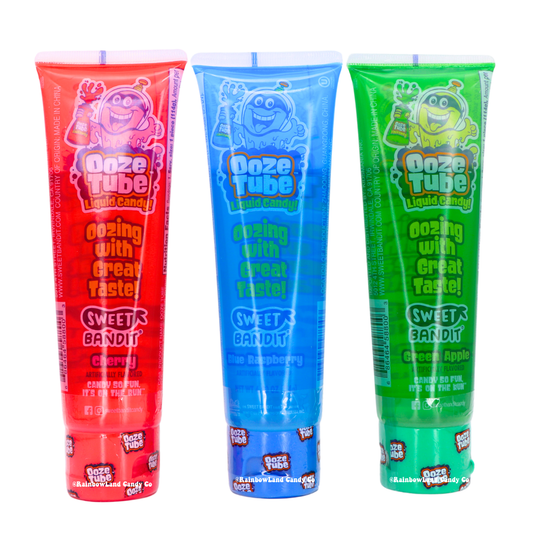 Ooze Tube liquid candy in cherry, blue raspberry, and green apple flavors.