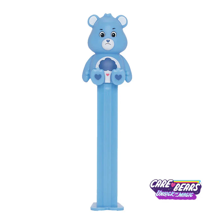 PEZ Care Bears dispenser featuring a colorful Care Bear character with PEZ candy inside.