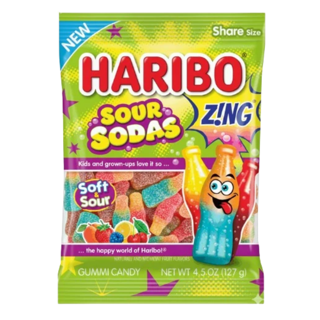 Haribo Sour Sodas gummy candy bag, green share size packaging with a cartoon soda bottle character, showing sour sugar-coated gummy bottles in yellow, orange, red, and teal through the window.