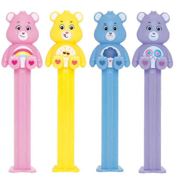 PEZ Care Bears dispensers featuring colorful characters like Cheer Bear and Funshine Bear.