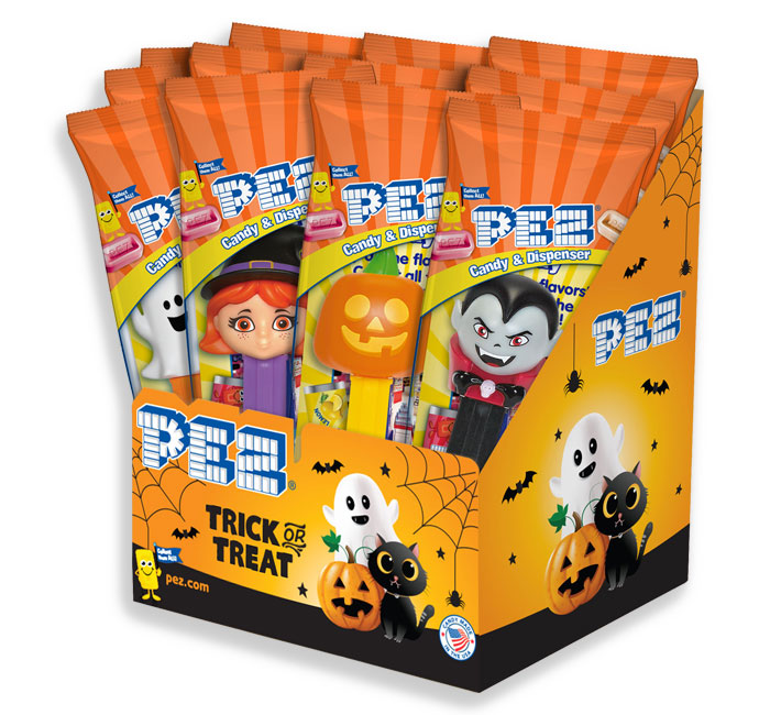 PEZ Halloween dispensers with assorted spooky characters in packaging.