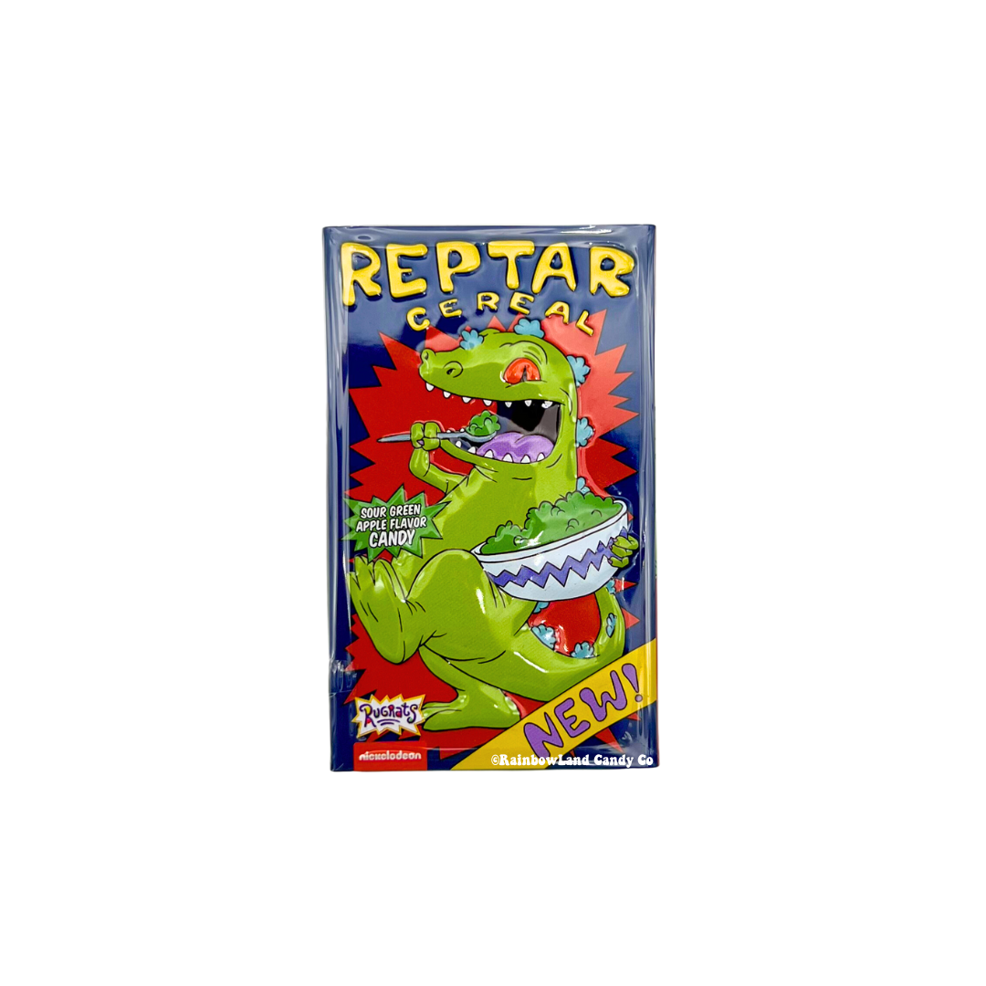 Rugrats Reptar Cereal Tin with Reptar illustration and sour green apple candy.