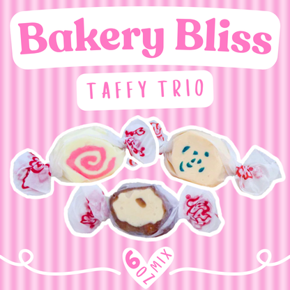 Bakery Bliss Taffy Trio promotional image showing three wrapped Salt Water Taffy pieces in Strawberry Cheesecake, Blueberry Muffin, and Chocolate Caramel Mocha flavors on a pink striped background with a "6 oz Mix" label.