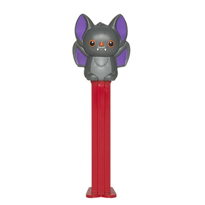 Halloween PEZ dispenser featuring a gray bat with purple ears and fangs, red dispenser, sold by RainbowLand Candy Co.