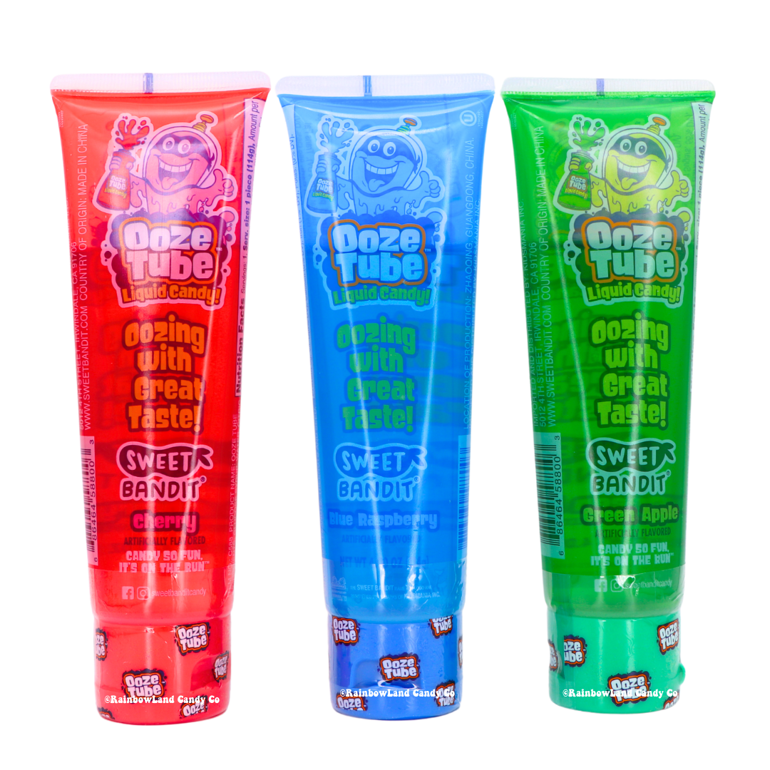 Ooze Tube liquid candy in cherry, blue raspberry, and green apple flavors.