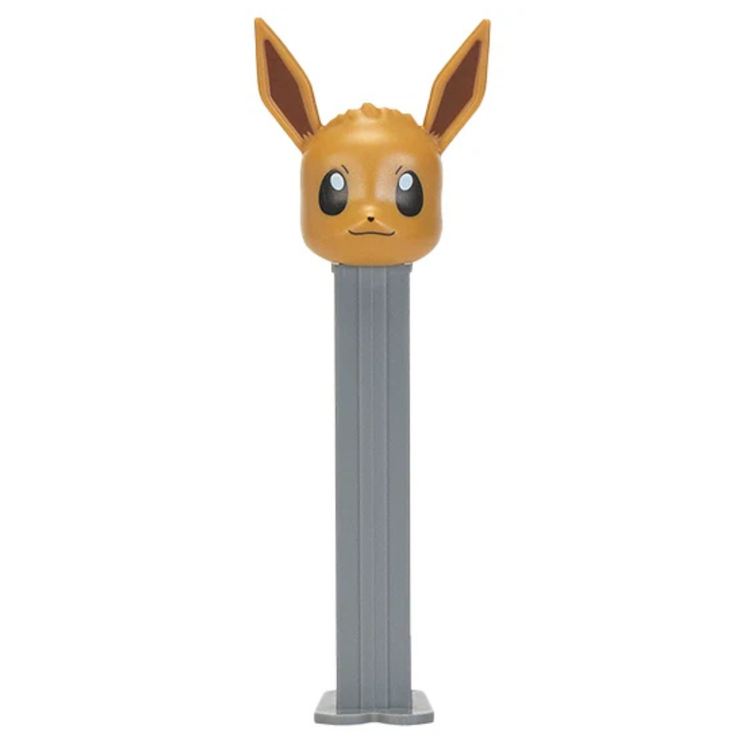 Eevee Pokémon PEZ dispenser featuring a tan and brown Eevee head with wide eyes and tall pointed ears on a gray dispenser.