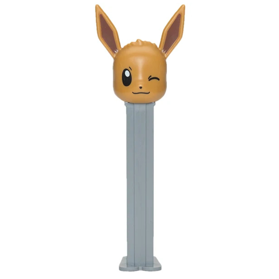 Eevee Pokémon PEZ dispenser featuring a tan and brown winking Eevee head with tall pointed ears on a gray dispenser.