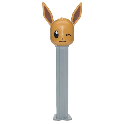 Eevee Pokémon PEZ dispenser featuring a tan and brown winking Eevee head with tall pointed ears on a gray dispenser.