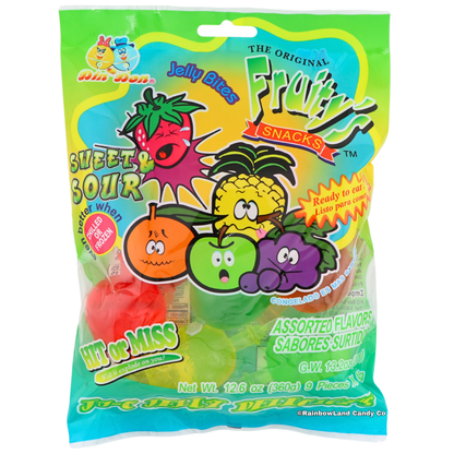Fruity's Sweet & Sour Jelly Bites 12.6 oz bag by Dindon Foods featuring cartoon strawberry, orange, apple, and grape characters with "Hit or Miss" and "Ready to Eat" callouts, showing assorted sour jelly candy fruits through the clear front window.