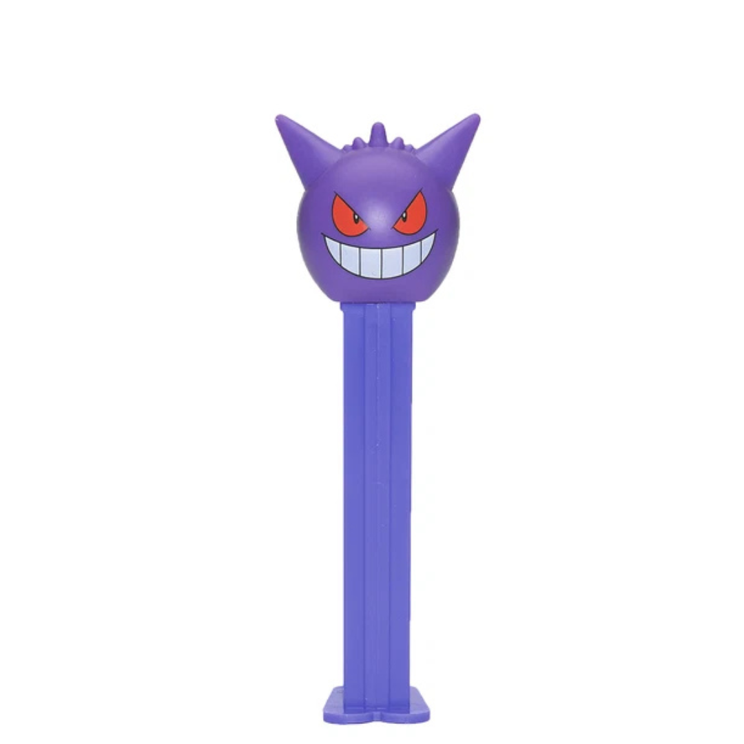 Gengar Pokémon PEZ dispenser featuring a purple Gengar head with spiked ears, red eyes, and a wide toothy grin on a purple dispenser.