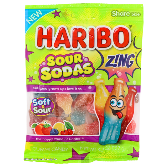 Green and purple Haribo Sour Sodas Zing share size candy bag featuring gummy soda bottle shapes in Lemon-Strawberry, Peach-Blue Raspberry, and Cherry-Cola flavors, labeled Soft & Sour, net weight 4.5 oz (127 g).