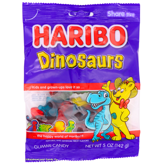 Purple Haribo Dinosaurs gummy candy bag featuring assorted fruit-flavored dinosaur-shaped gummies in red, green, yellow, and blue, with the Haribo bear and blue T-Rex mascot characters on the front.