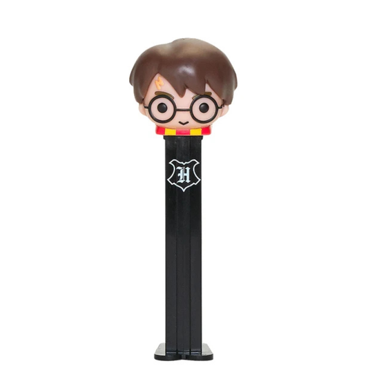 Harry Potter PEZ dispenser, brown tousled hair, round glasses, lightning bolt scar, red and yellow house scarf, black dispenser with Hogwarts crest.