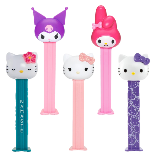 Five Hello Kitty & Friends PEZ dispensers from RainbowLand Candy Co, featuring Hello Kitty Namasté, Kuromi, Hello Kitty Pink Bow, My Melody, and Hello Kitty Purple Bow designs, each on its own colored dispenser.