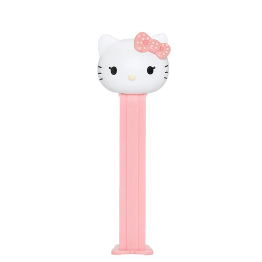 Hello Kitty & Friends PEZ dispenser featuring Hello Kitty with a pink polka dot bow, pink dispenser, sold by RainbowLand Candy Co.