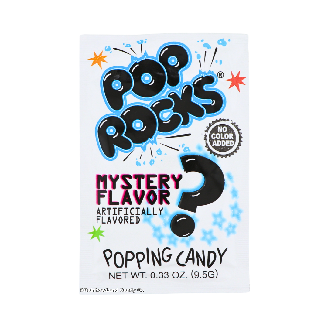 White Pop Rocks Mystery Flavor popping candy packet featuring the black bubble-letter Pop Rocks logo, a black question mark graphic, "No Color Added" seal, and colorful star accents, 0.33 oz popping candy