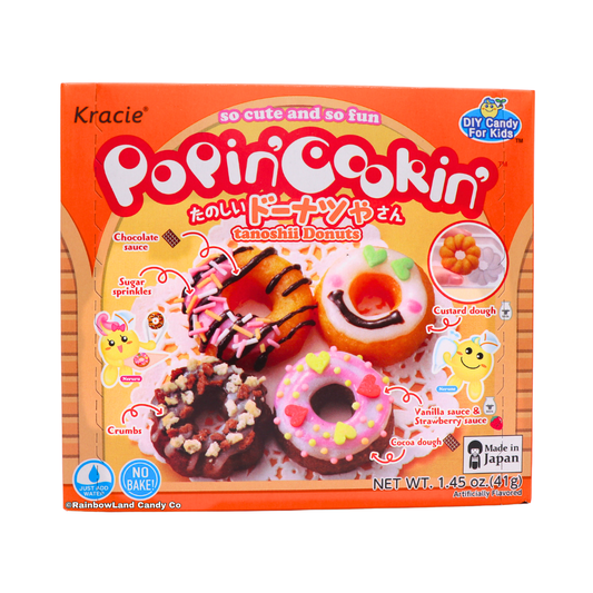 Orange Kracie Popin' Cookin' Donuts DIY candy kit box featuring four mini candy donuts topped with chocolate sauce, pink glaze, sugar sprinkles, and candy crumbs.