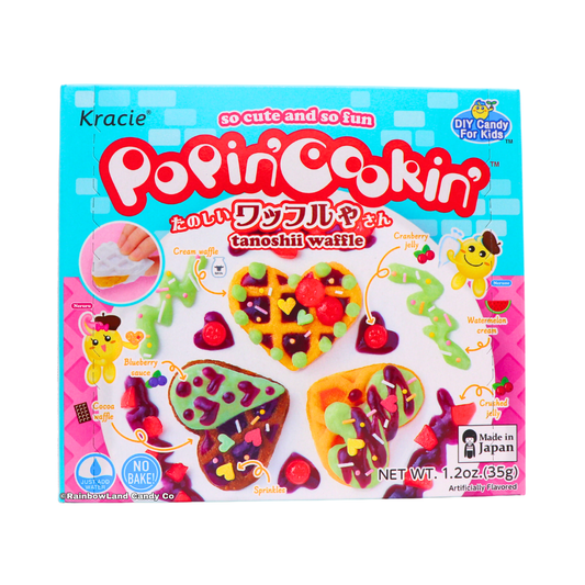 Teal Kracie Popin' Cookin' Waffle DIY candy kit box featuring four heart-shaped candy waffles topped with cranberry jelly, blueberry sauce, watermelon cream, and sprinkles.