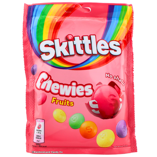Pink 137g bag of Skittles Chewies Fruits imported from the UK featuring soft shell-free Skittles candy pieces in Blackcurrant, Lime, Lemon, Orange, and Strawberry flavors with a rainbow design and "No Shell" callout.