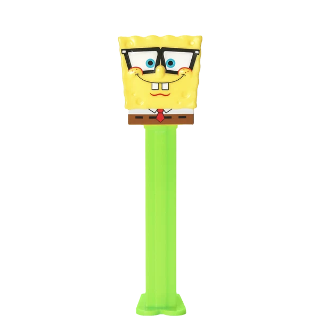 SpongeBob SquarePants PEZ dispenser wearing black-framed glasses, with a red tie, brown pants, and a green candy stem.