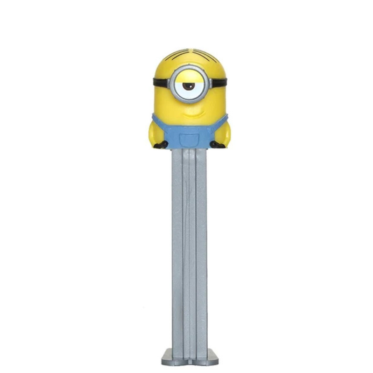 A Minions-themed Pez dispenser featuring a yellow character head with one eye and a blue over-ear headphone design on the body, set against a plain white background.