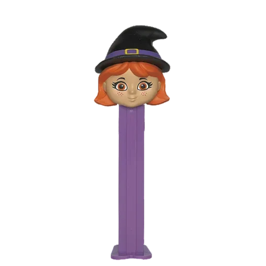 Halloween PEZ dispenser featuring a witch with orange hair and a black witch hat, purple dispenser, sold by RainbowLand Candy Co.