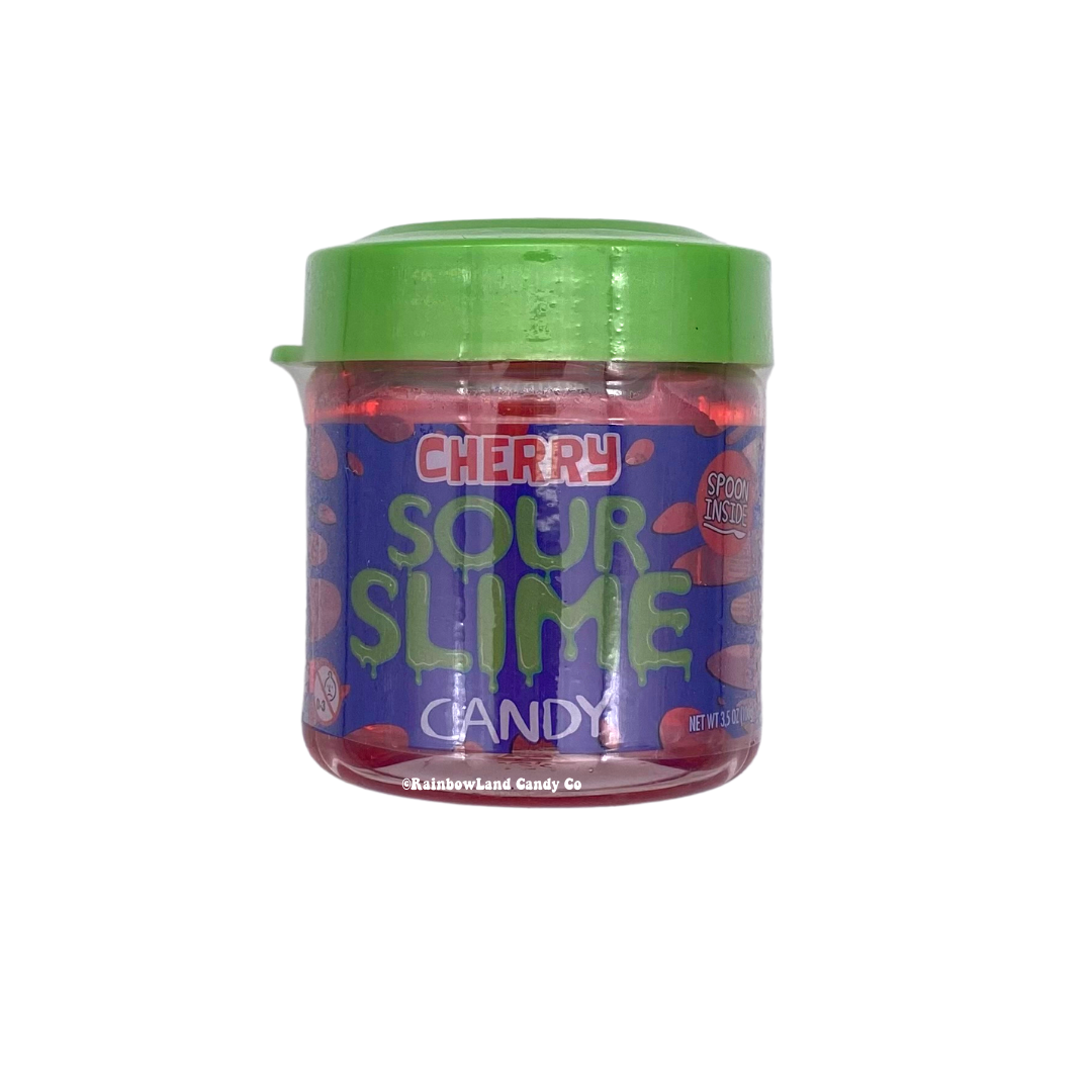 Sour Slime Candy cherry flavor 3.5oz jar with thick scoopable red sour gel candy and spoon included inside, featuring purple label with cherry sour slime candy branding.