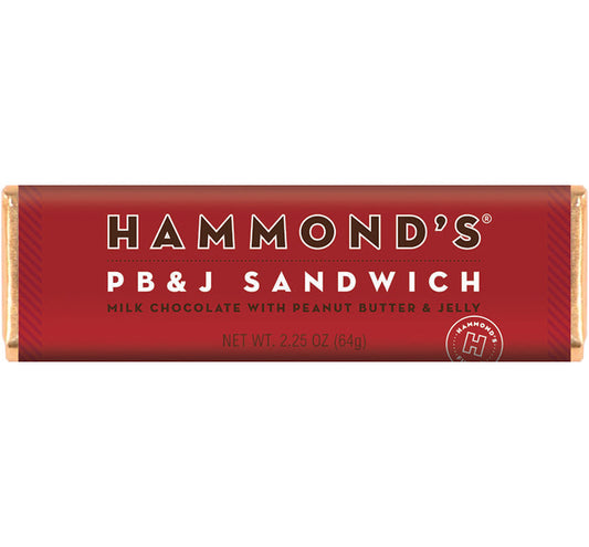 Red 2.25 oz Hammond's PB&J Sandwich Chocolate Bar wrapper featuring "Milk Chocolate with Peanut Butter & Jelly" labeling and the Hammond's brand logo on a bold red background.
